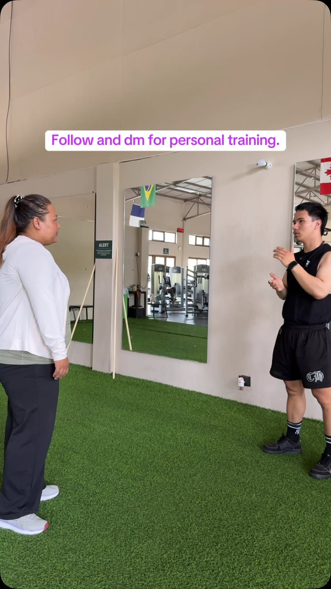 Coach Kushal speaking with a personal training client